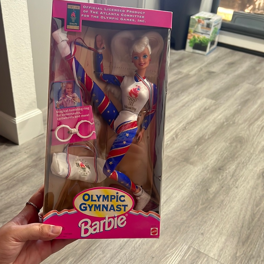 Never opened Authentic Olympic Barbie
